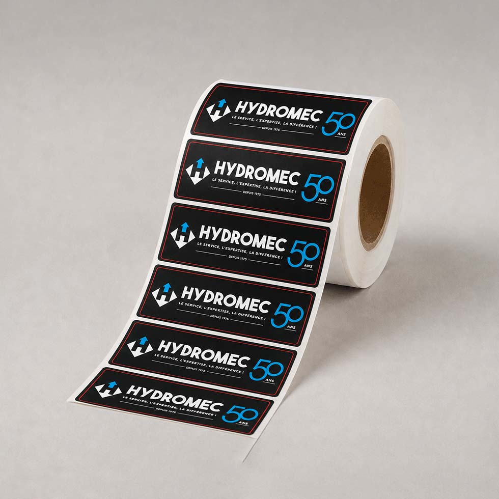 etiquettes-a-rouleau-personnalise-hydromec-logo-tnt-atelier-imprimerie-saguenay-lac-saint-jean etiquettes-a-rouleau-personnalise-hydromec-logo-tnt-atelier-imprimerie-saguenay-lac-saint-jean